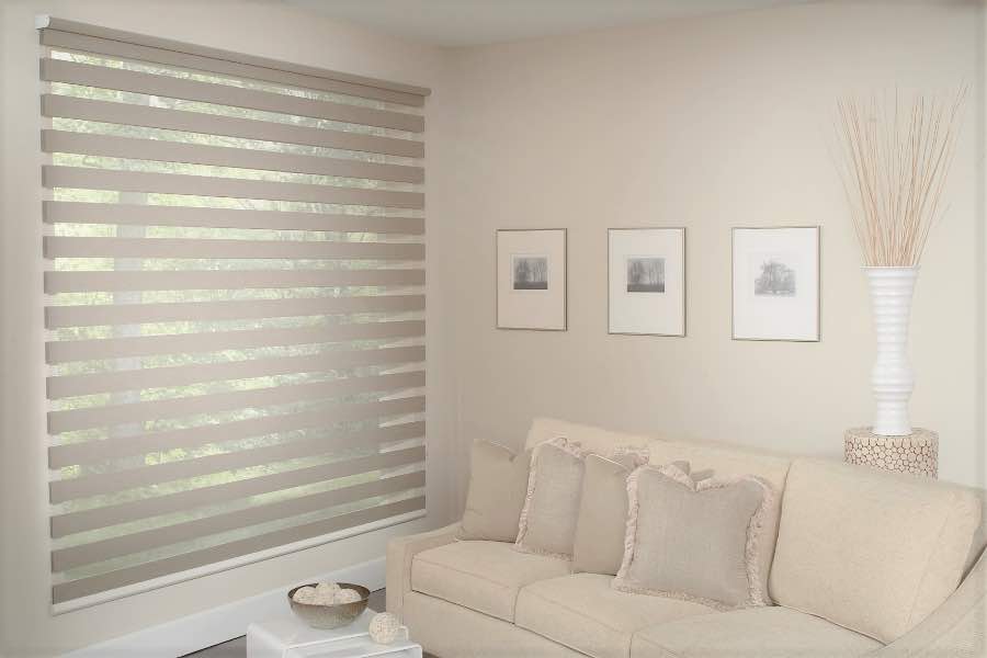 Zebra shades give you a unique combination of light control and style that benefits your Bakersfield home. Zebra shade allows filtered light into a living room