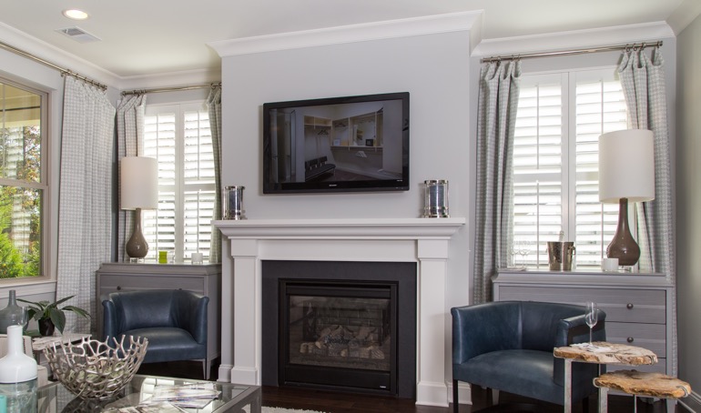 Bakersfield fireplace with white shutters.