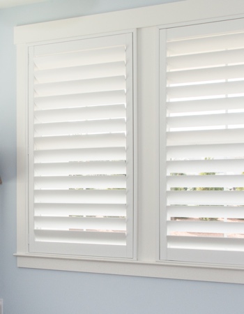White plantation shutters with hidden tilt rods in Bakersfield