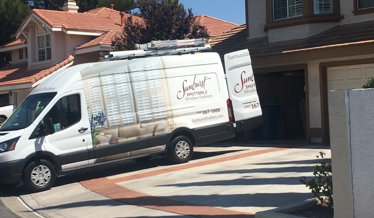 During an in-home consultation, we bring the showroom to your house. Alt text: Sunburst Shutters van at customer's home.