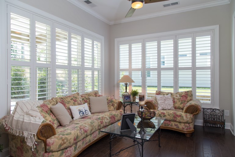 Sunroom with plantation shutters in Bakersfield.