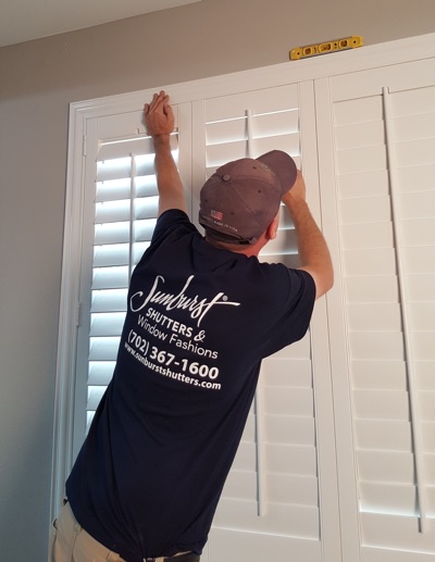 Shutter installation in Bakersfield bedroom.