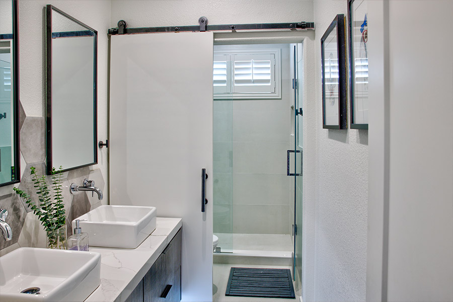 Get all the privacy, energy efficiency, and durability you need on basement bathroom windows with Polywood shutters. Polywood shutters on a basement shower window