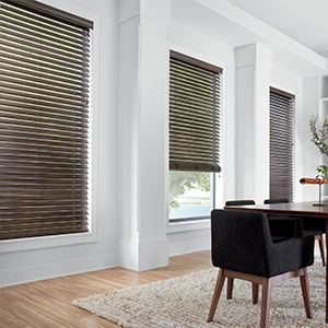 Dark wooden blinds in a large dining room area