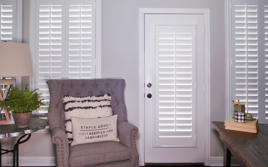 Interior shutters are beautiful and durable window treatments for glass doors in Bakersfield. Polywood shutters on a door