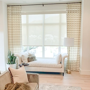 motorized shades in beige with a light and airy living room