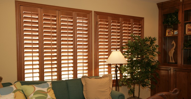 Natural wood shutters in Bakersfield living room.