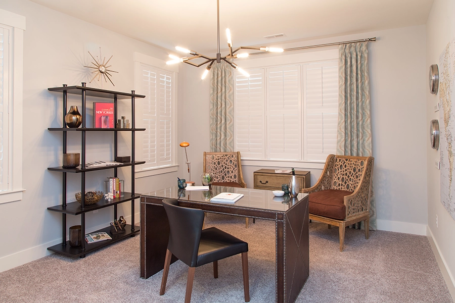 White Polywood shutters on home office windows of different sizes