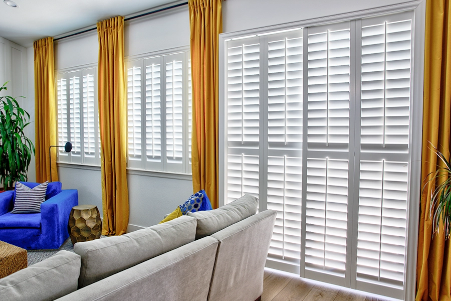  White Polywood shutters on living room windows
